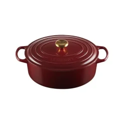 Cocotte en Fonte Ovale 31 cm Garnet Bouton Doré Le Creuset Signature