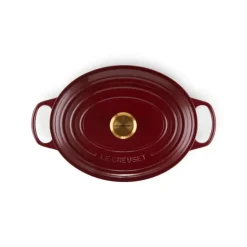 Cocotte en Fonte Ovale 31 cm Garnet Bouton Doré Le Creuset Signature