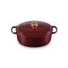 Cocotte en Fonte Ovale 29 cm Garnet Bouton Doré Le Creuset Signature