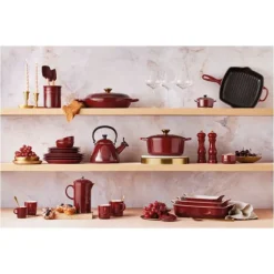 Cocotte en Fonte Ronde 28 cm Garnet Bouton Doré Le Creuset Signature